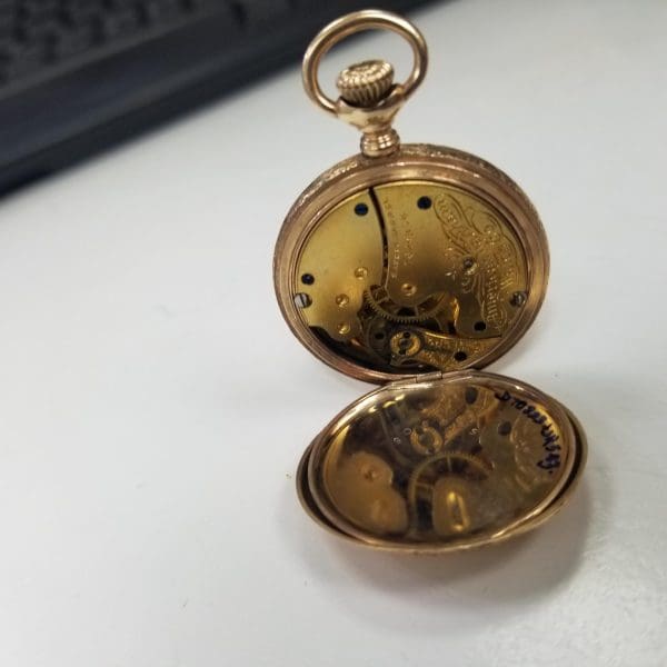 14k yellow gold American Waltham hand engraved pocket watch with white dial 7