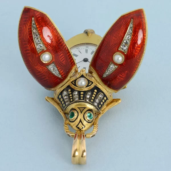 GOLD AND ENAMEL BEETLE FORM WATCH 8